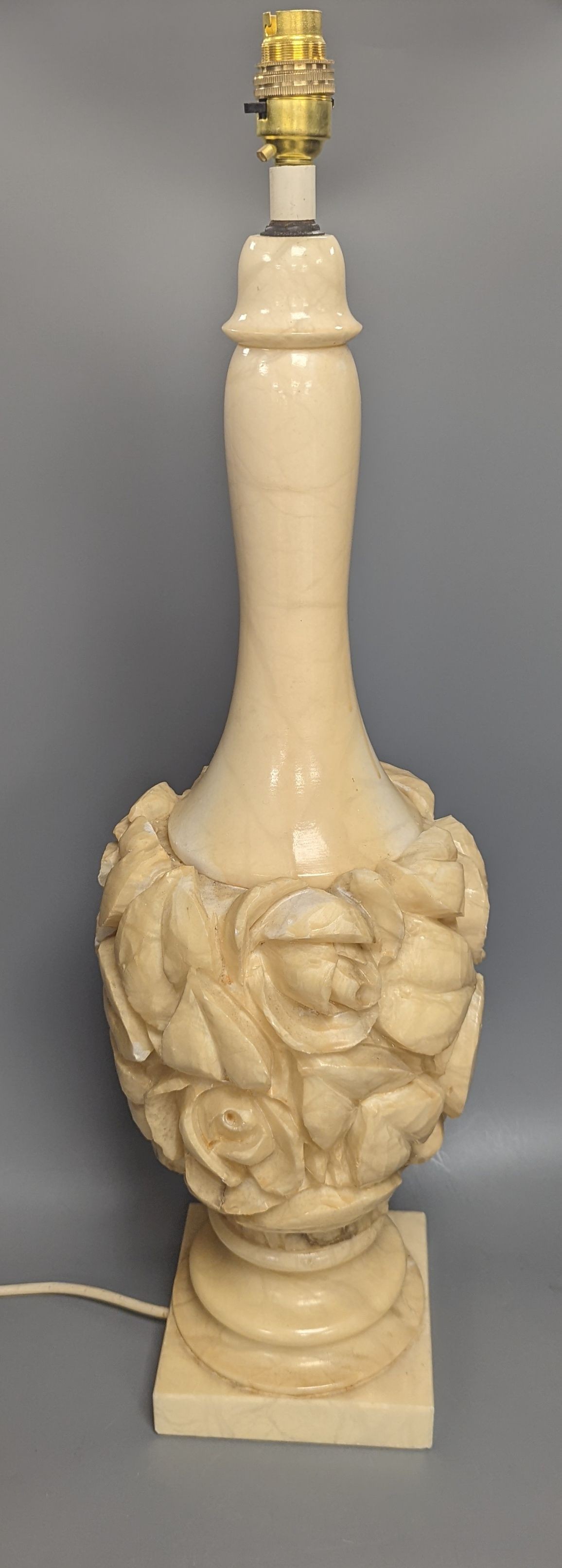 A carved alabaster lamp, height 60cm excl. light fitting, and a turned alabaster plafonnier, 35.5 cm diameter